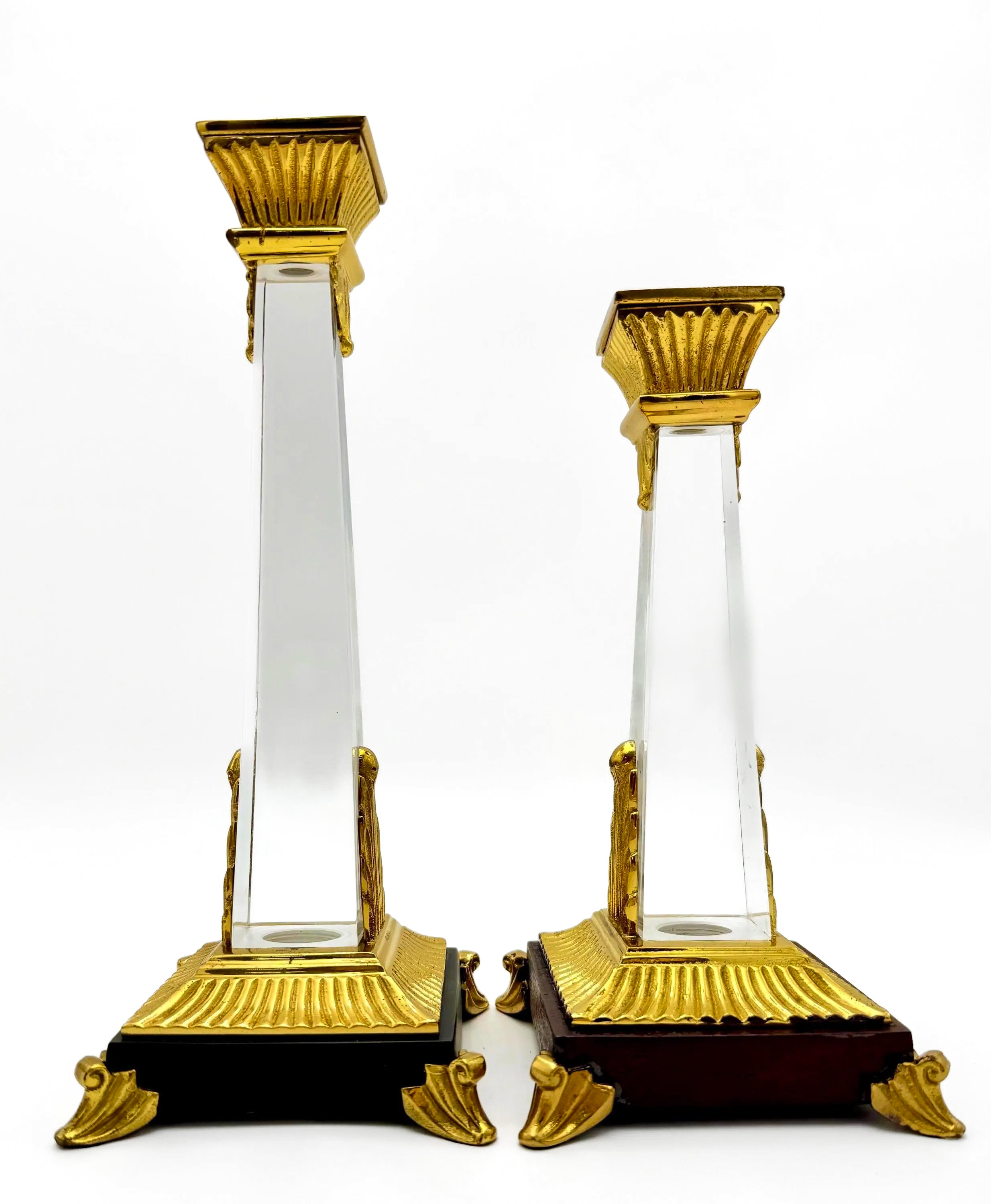 Sleek pair of vintage Art Deco style clear Lucite candlesticks with geometric tiered bases.
