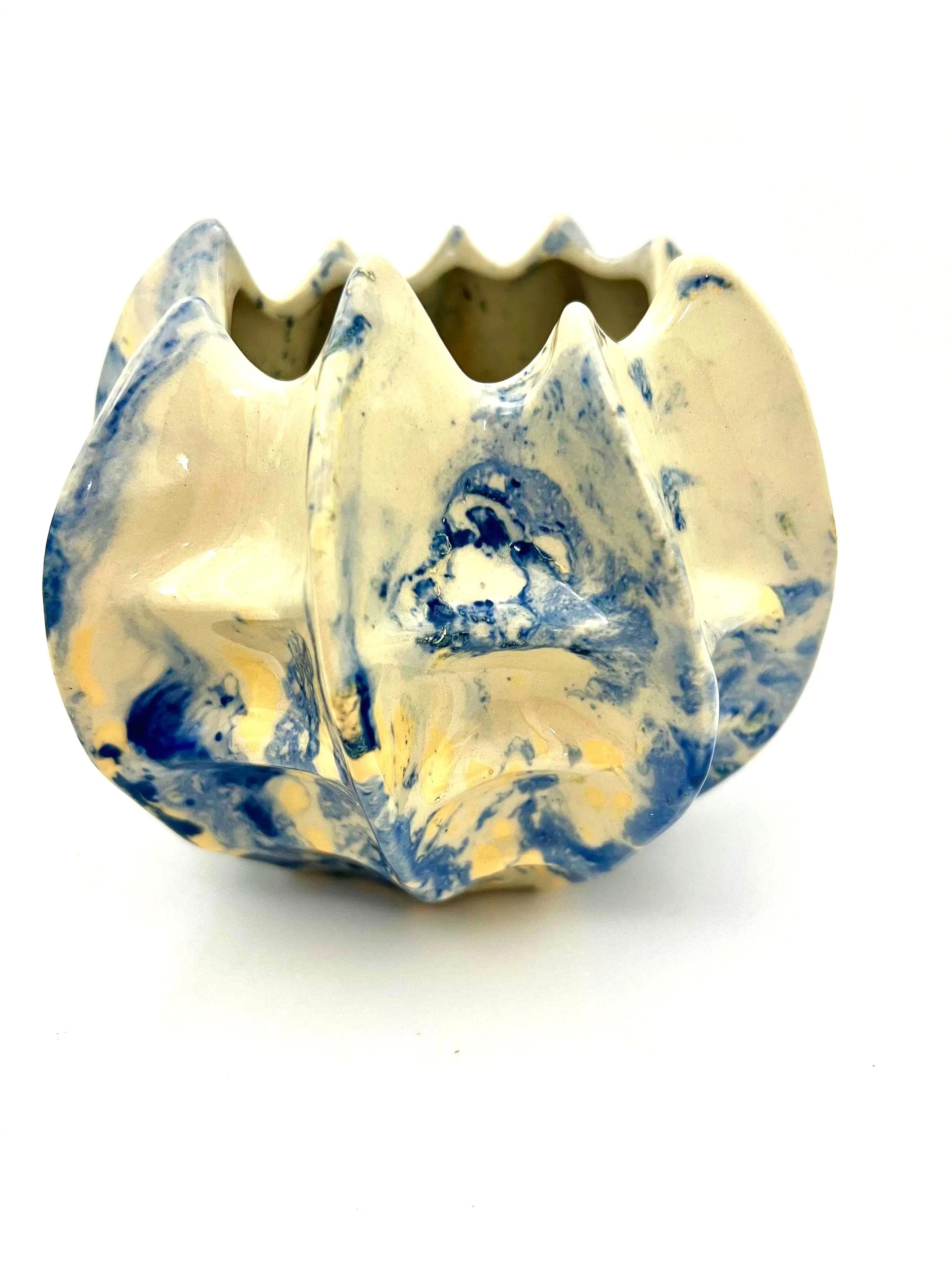 Pair of vintage ceramic planters or candle holders with an abstract blue and white splatter-ware pattern.
