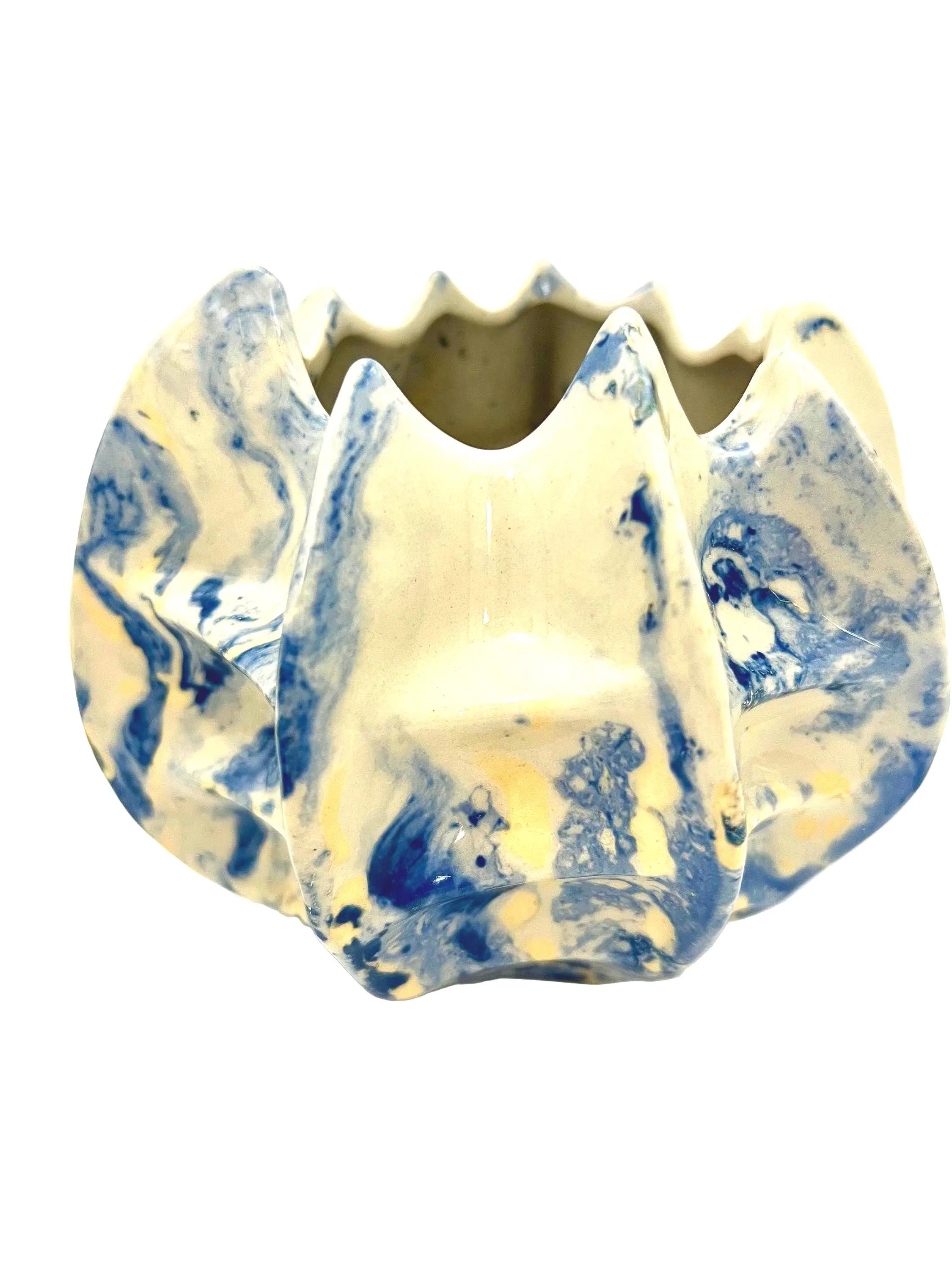 Pair of vintage ceramic planters or candle holders with an abstract blue and white splatter-ware pattern.