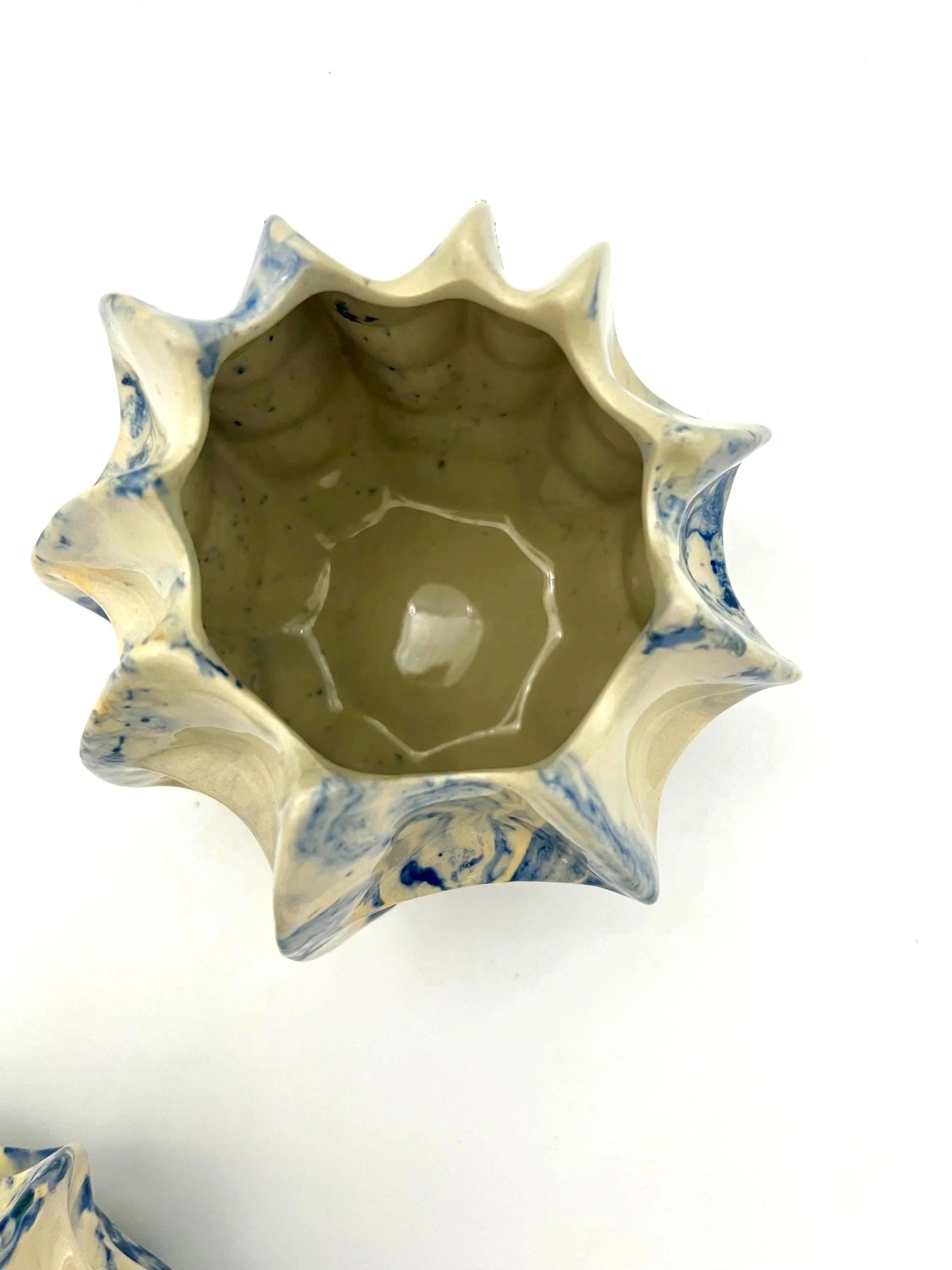 Pair of vintage ceramic planters or candle holders with an abstract blue and white splatter-ware pattern.