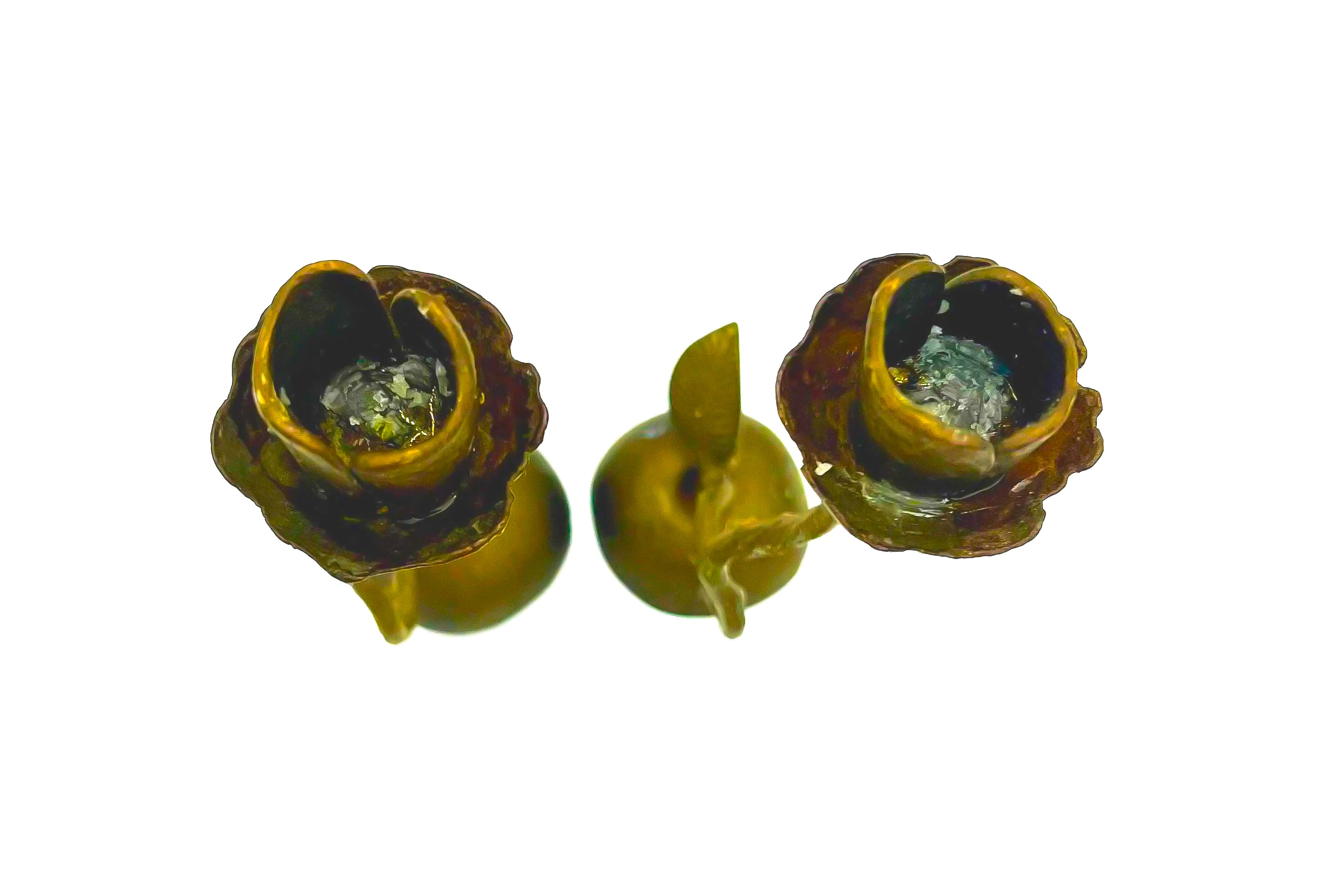 Pair of artistic hand-forged bronze taper candle holders shaped like long-stemmed roses.