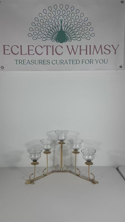 Mid-century solid brass candelabra with adjustable arms for custom candle positioning.