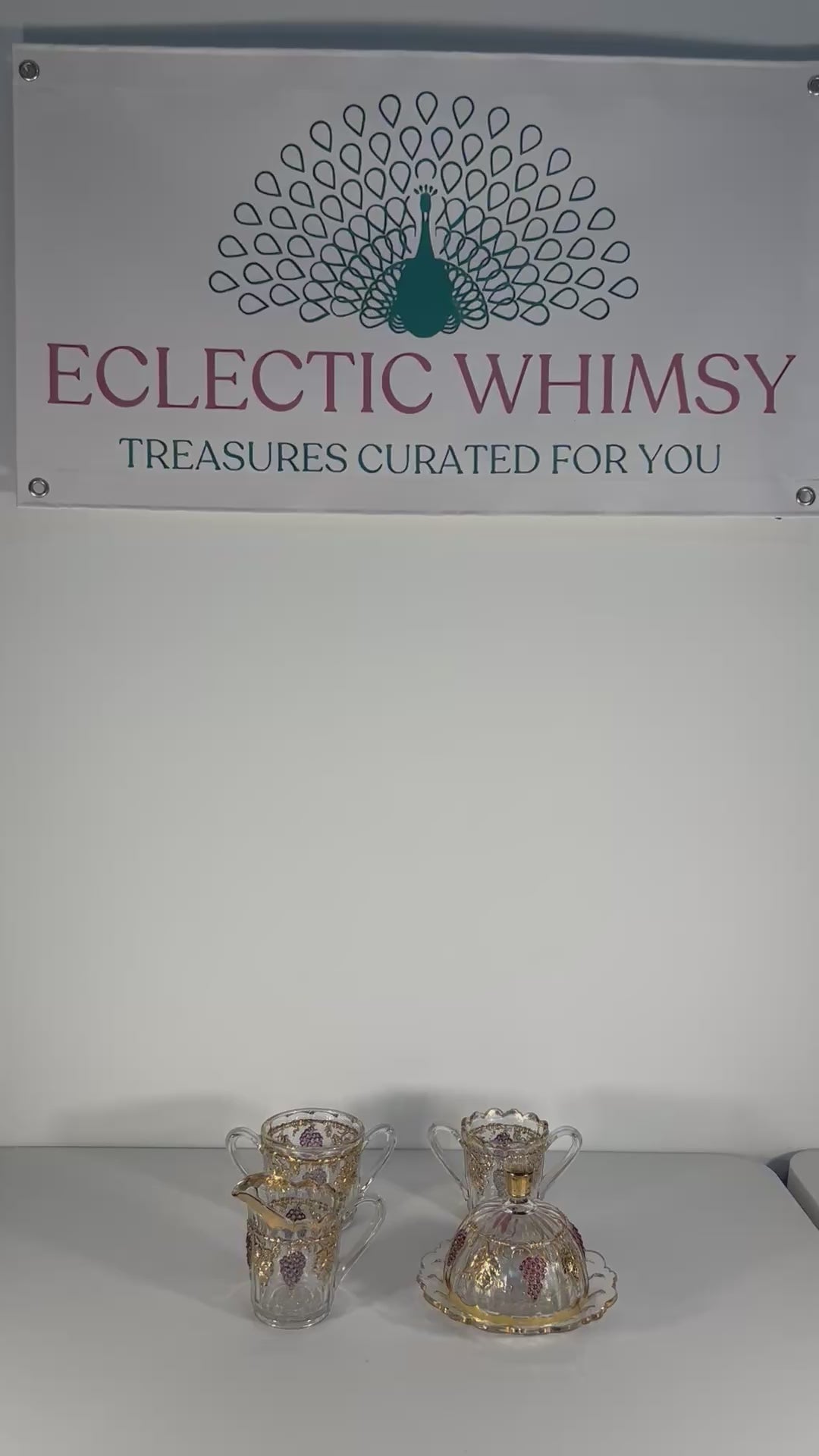 Antique Early American Pattern Glass (EAPG) brunch set featuring a detailed grape and leaf relief.
