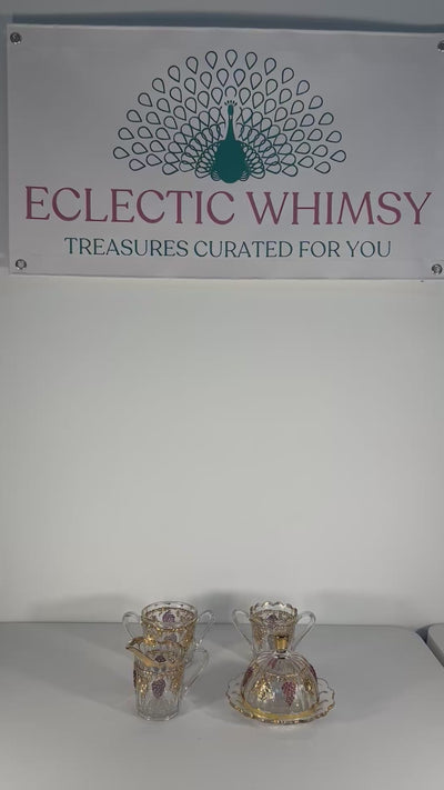 Antique Early American Pattern Glass (EAPG) brunch set featuring a detailed grape and leaf relief.