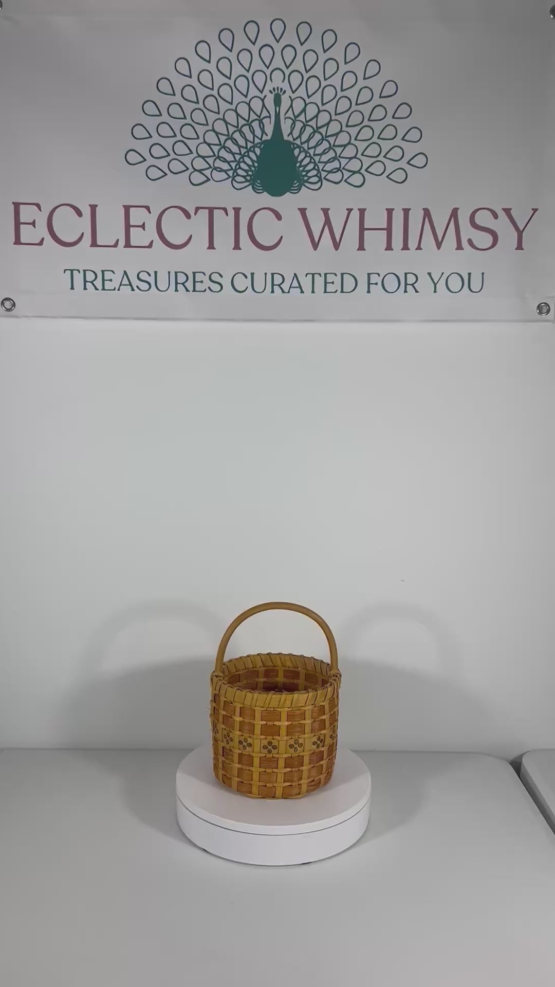 One-of-a-kind vintage artist-signed basket featuring intricate handmade weaving and natural materials.