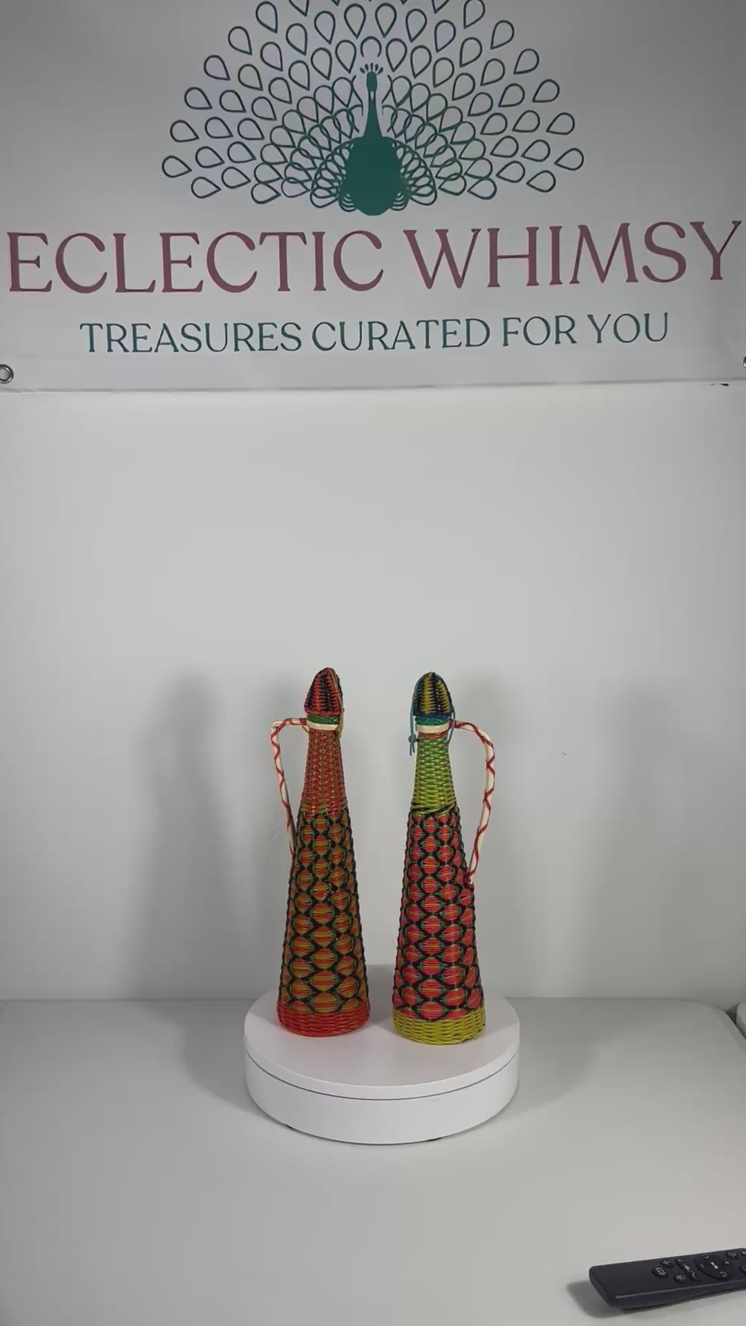 Spanish vintage decanter wrapped in colorful 1960s boho Scoubidou woven plastic webbing.