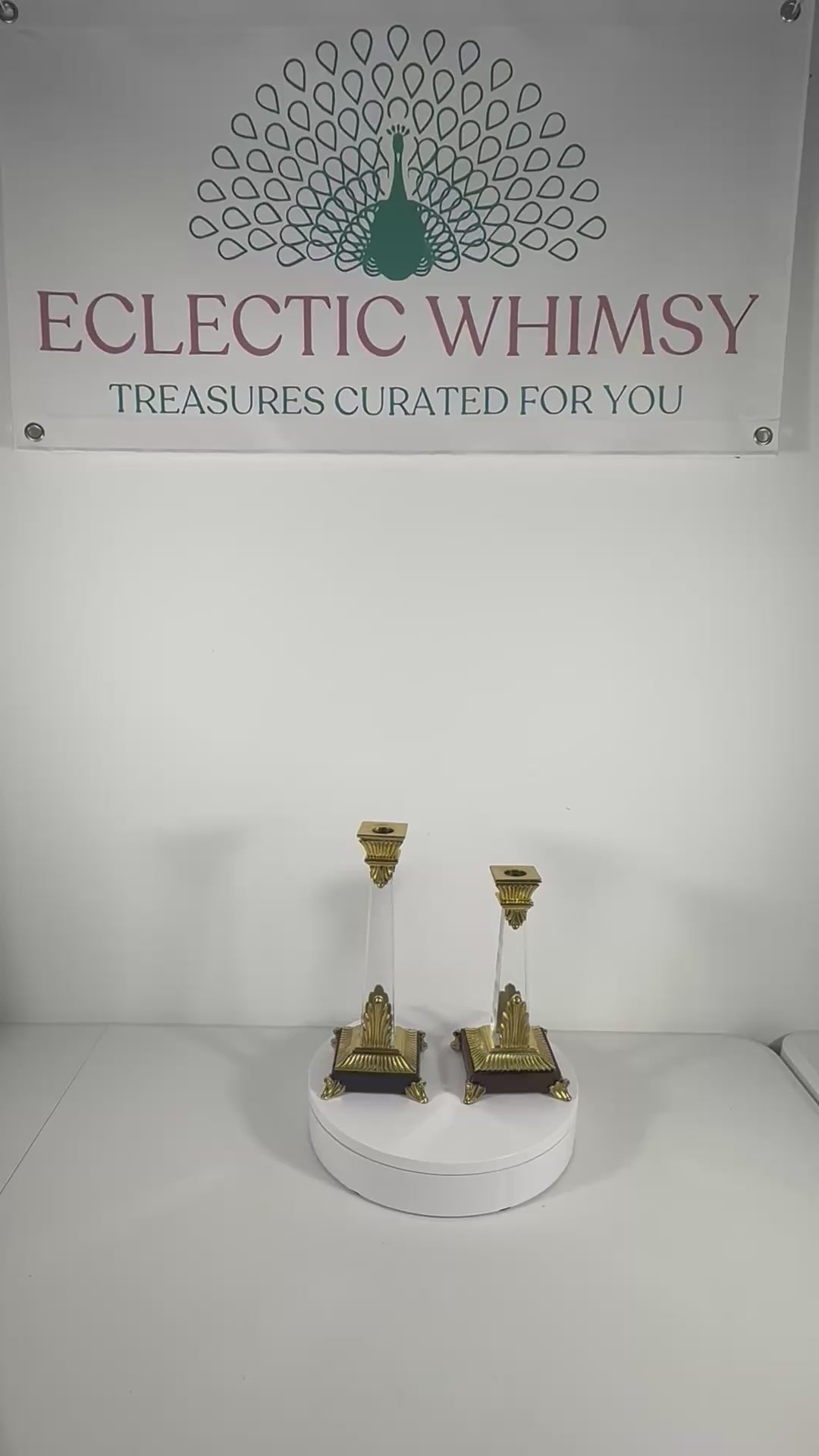 Sleek pair of vintage Art Deco style clear Lucite candlesticks with geometric tiered bases.