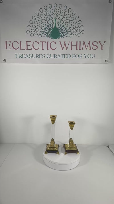 Sleek pair of vintage Art Deco style clear Lucite candlesticks with geometric tiered bases.