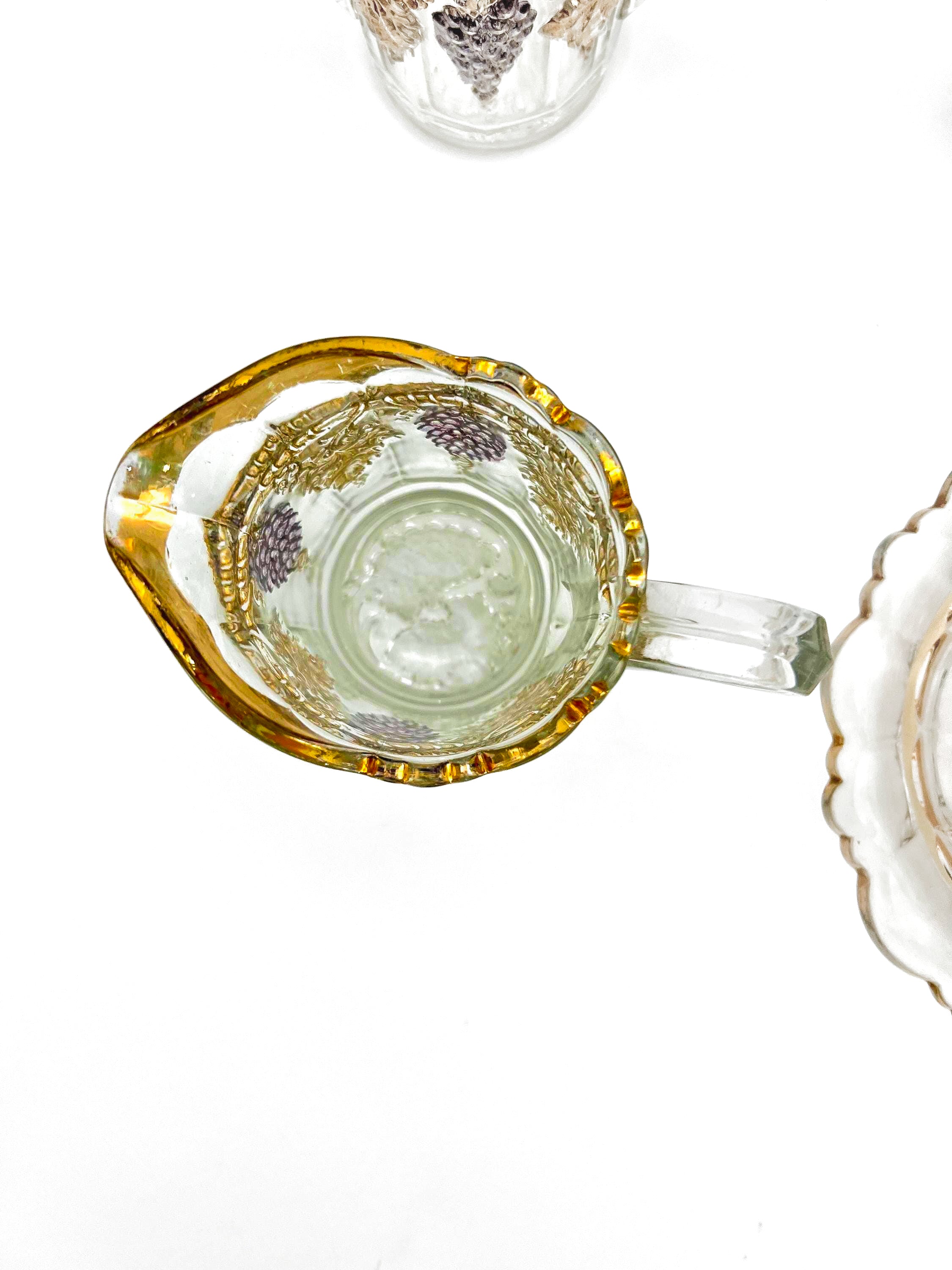 Antique Early American Pattern Glass (EAPG) brunch set featuring a detailed grape and leaf relief.