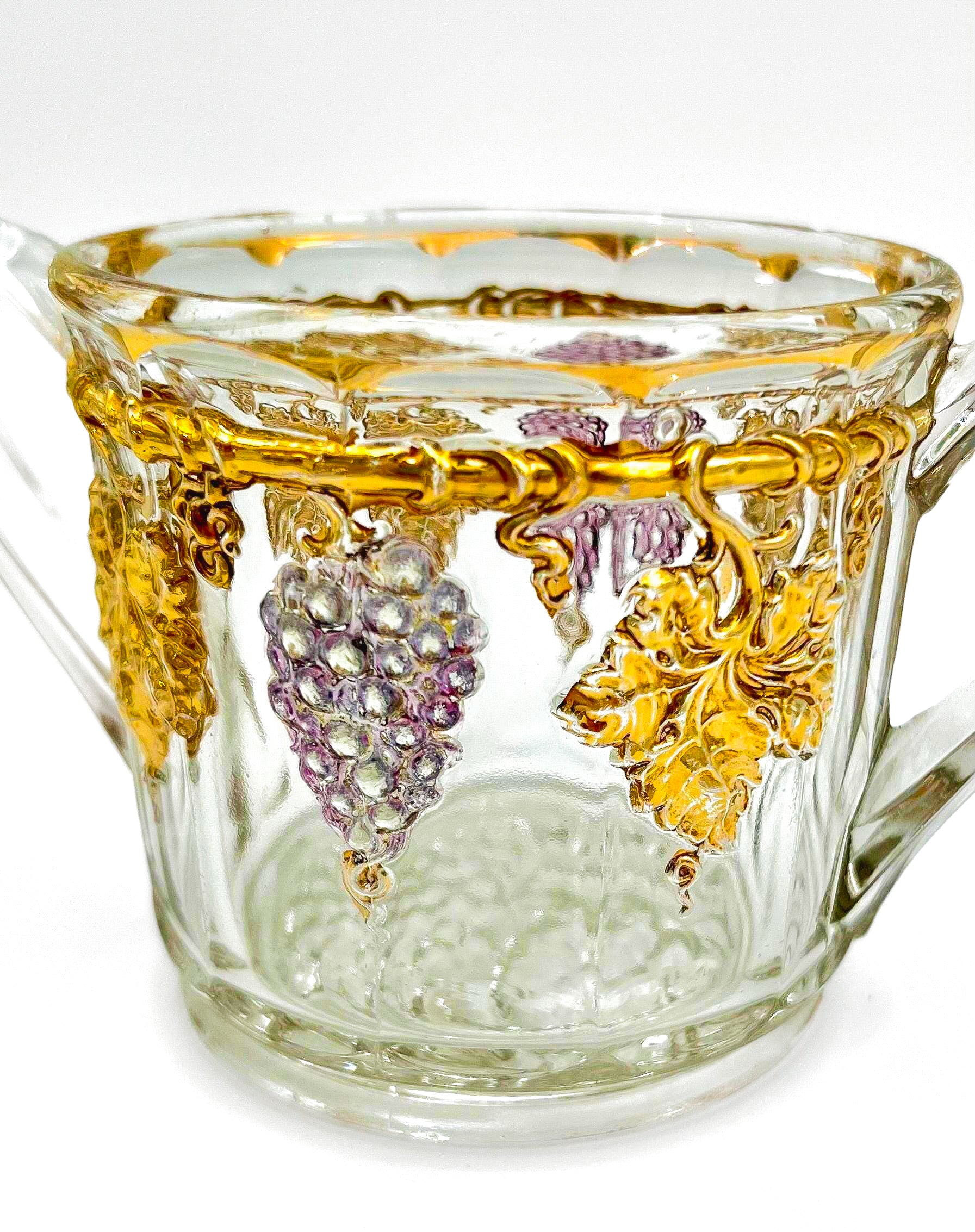 Antique Early American Pattern Glass (EAPG) brunch set featuring a detailed grape and leaf relief.