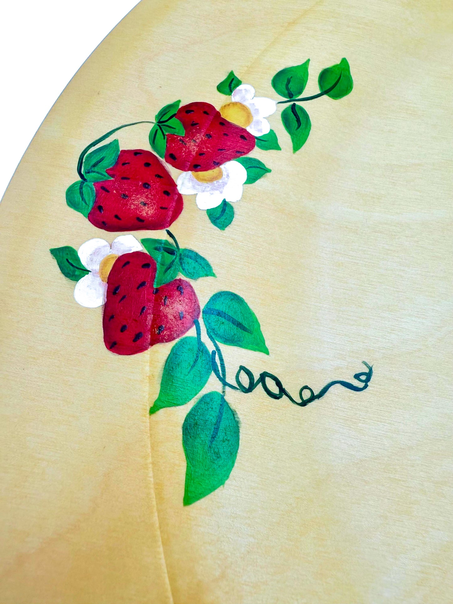 Set of 4 vintage wooden serving chargers hand-painted with realistic strawberry and leaf designs.
