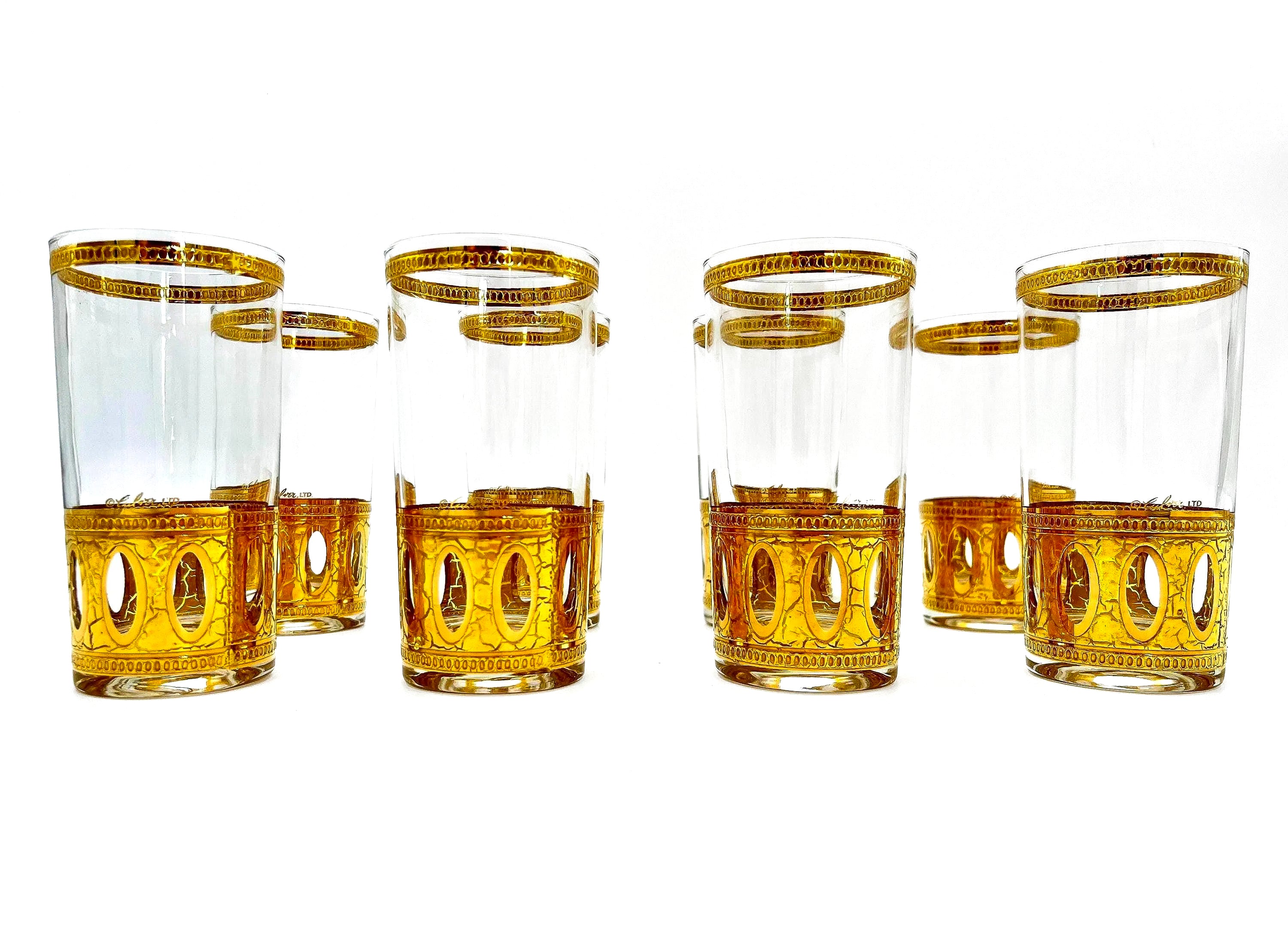 Set of 8 signed vintage Culver highball glasses featuring an intricate 22k gold geometric pattern.