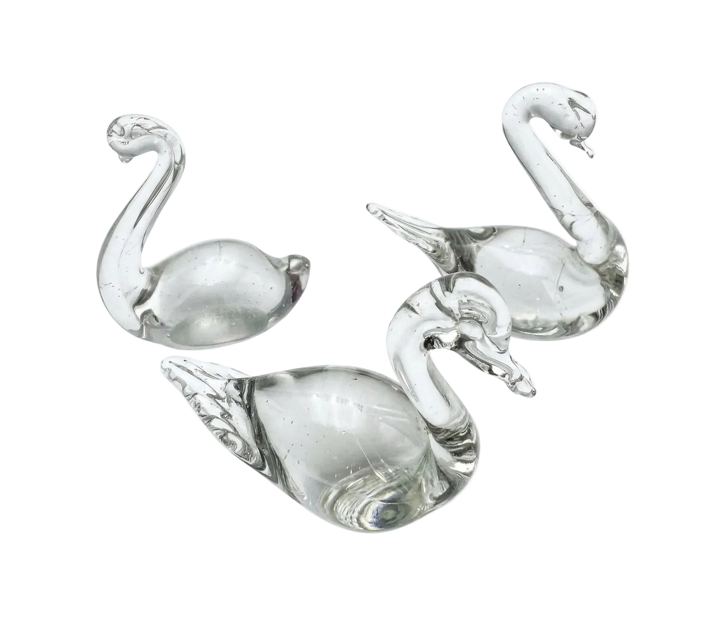 Trio of Swedish vintage art glass figurines featuring two minimalist ducks and one swan in clear hand-blown glass.