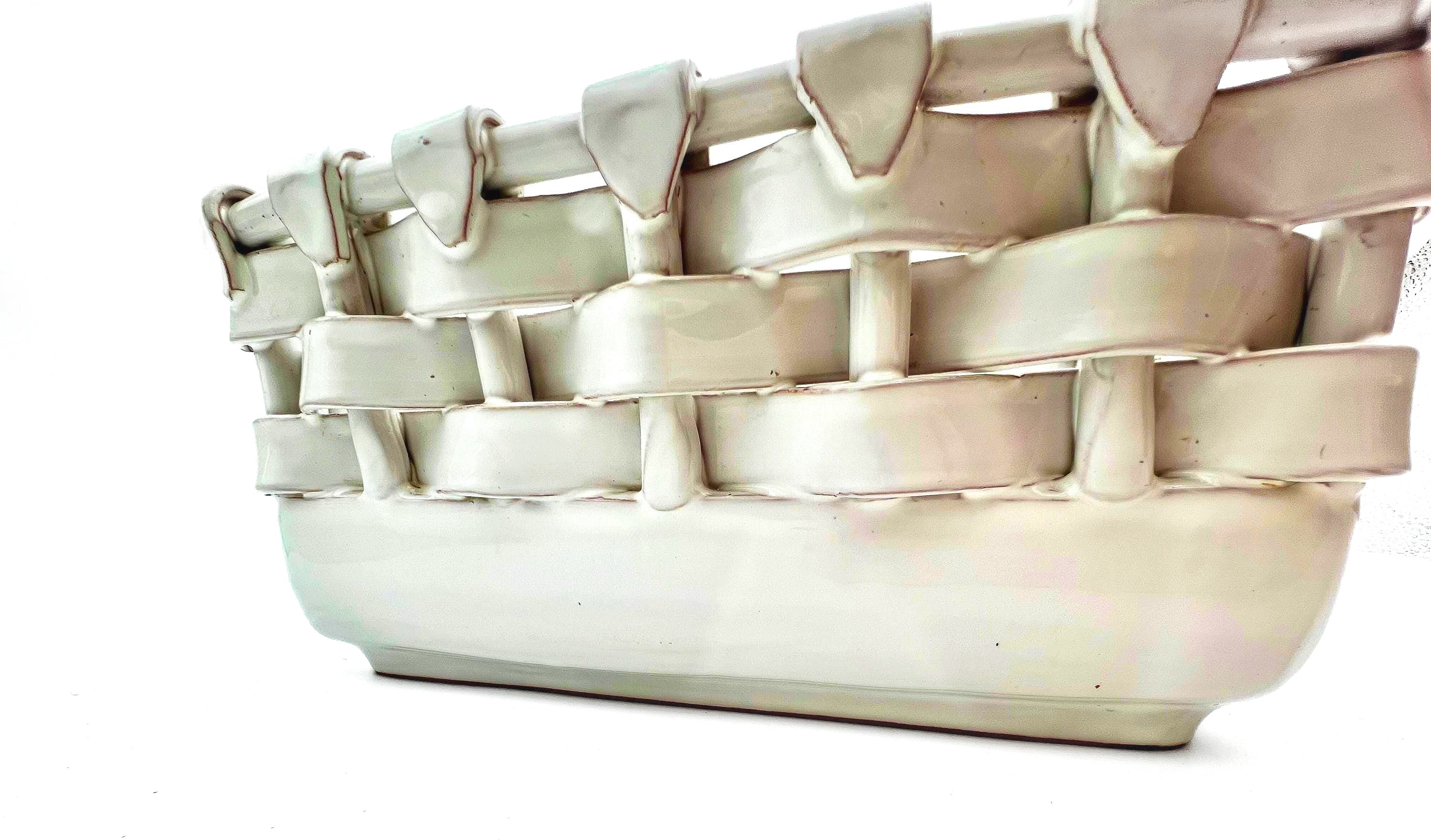 Italian glazed terra cotta decorative basket with a realistic ceramic woven texture.
