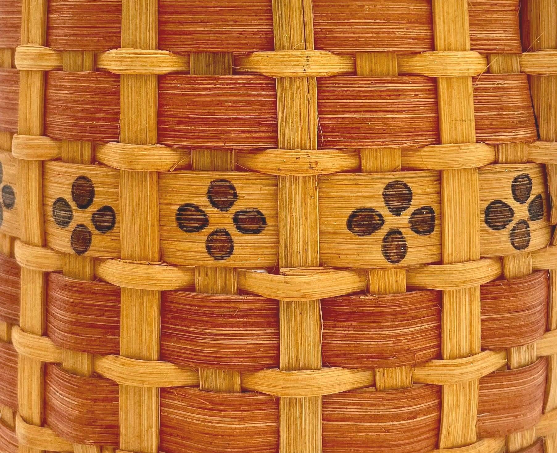 One-of-a-kind vintage artist-signed basket featuring intricate handmade weaving and natural materials.