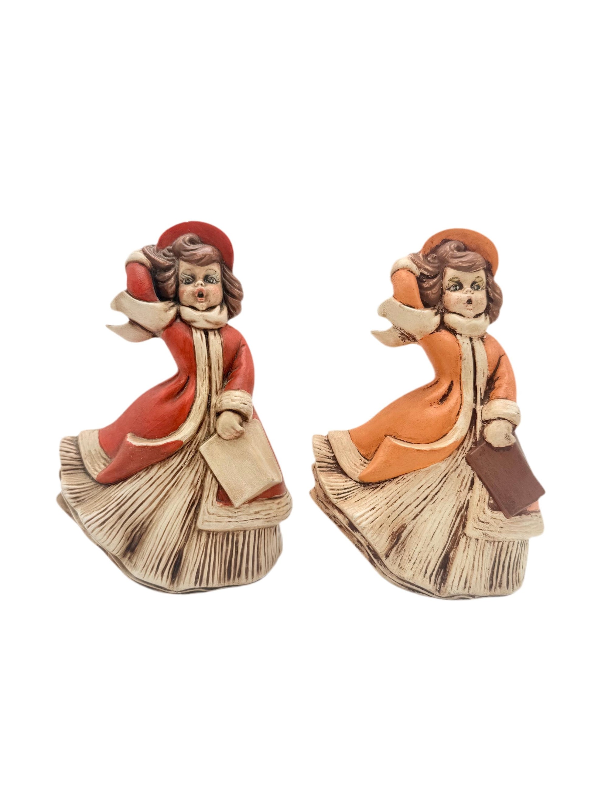 Pair of 1971 vintage Atlantic Mold ceramic figurines of young girls singing Christmas carols.