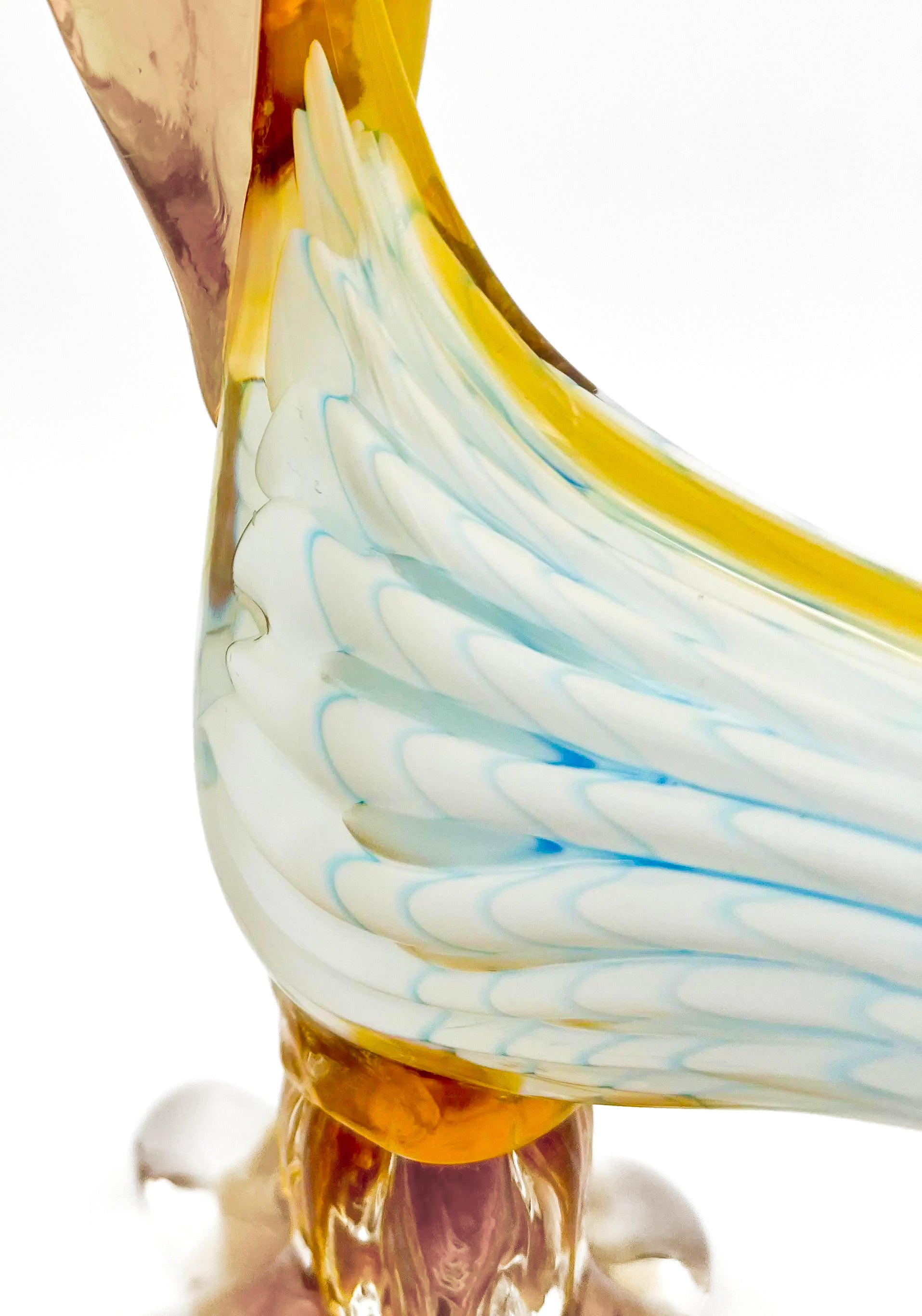 Small decorative vintage figurine of a bird made from delicately hand-blown clear glass.