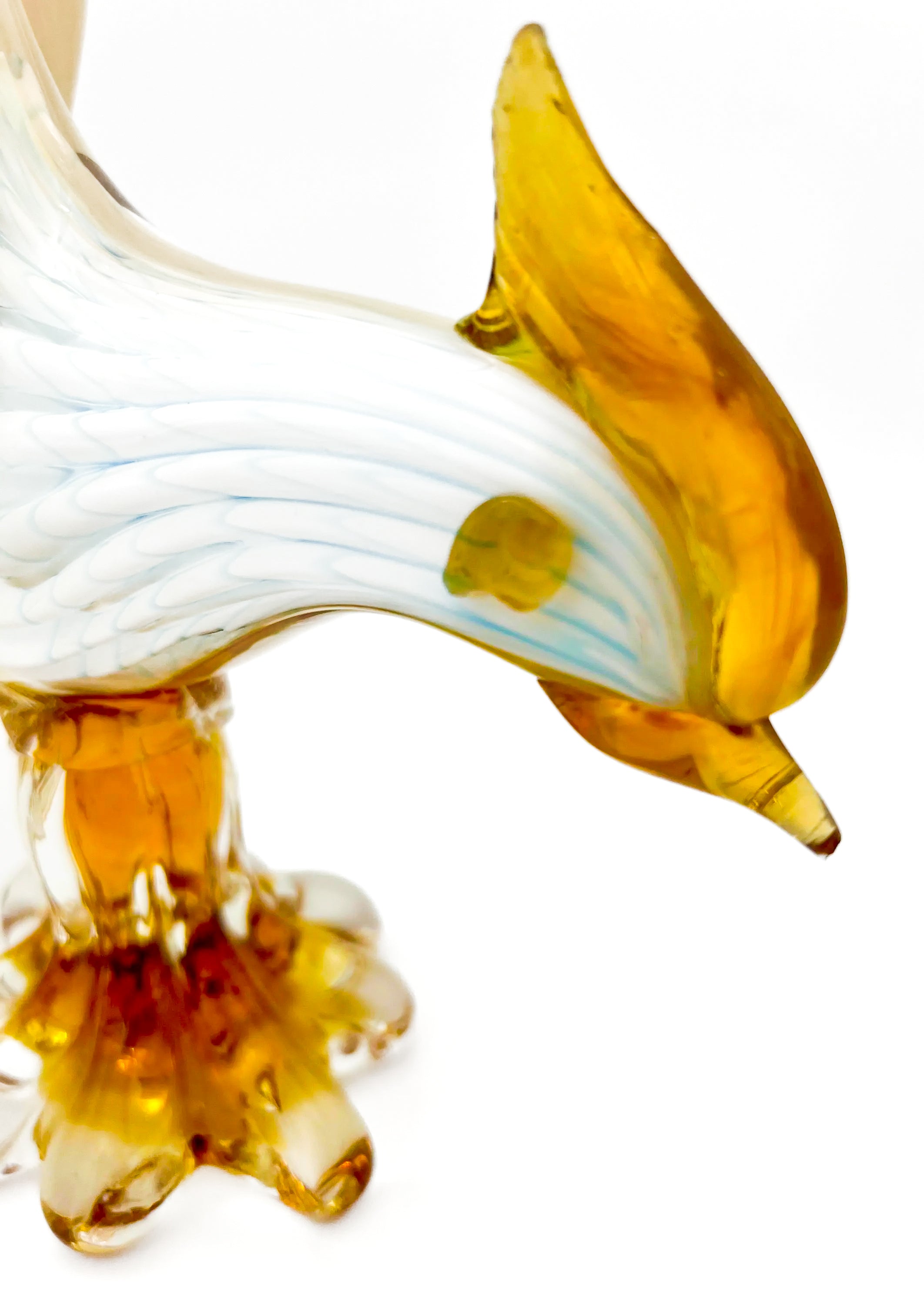Small decorative vintage figurine of a bird made from delicately hand-blown clear glass.