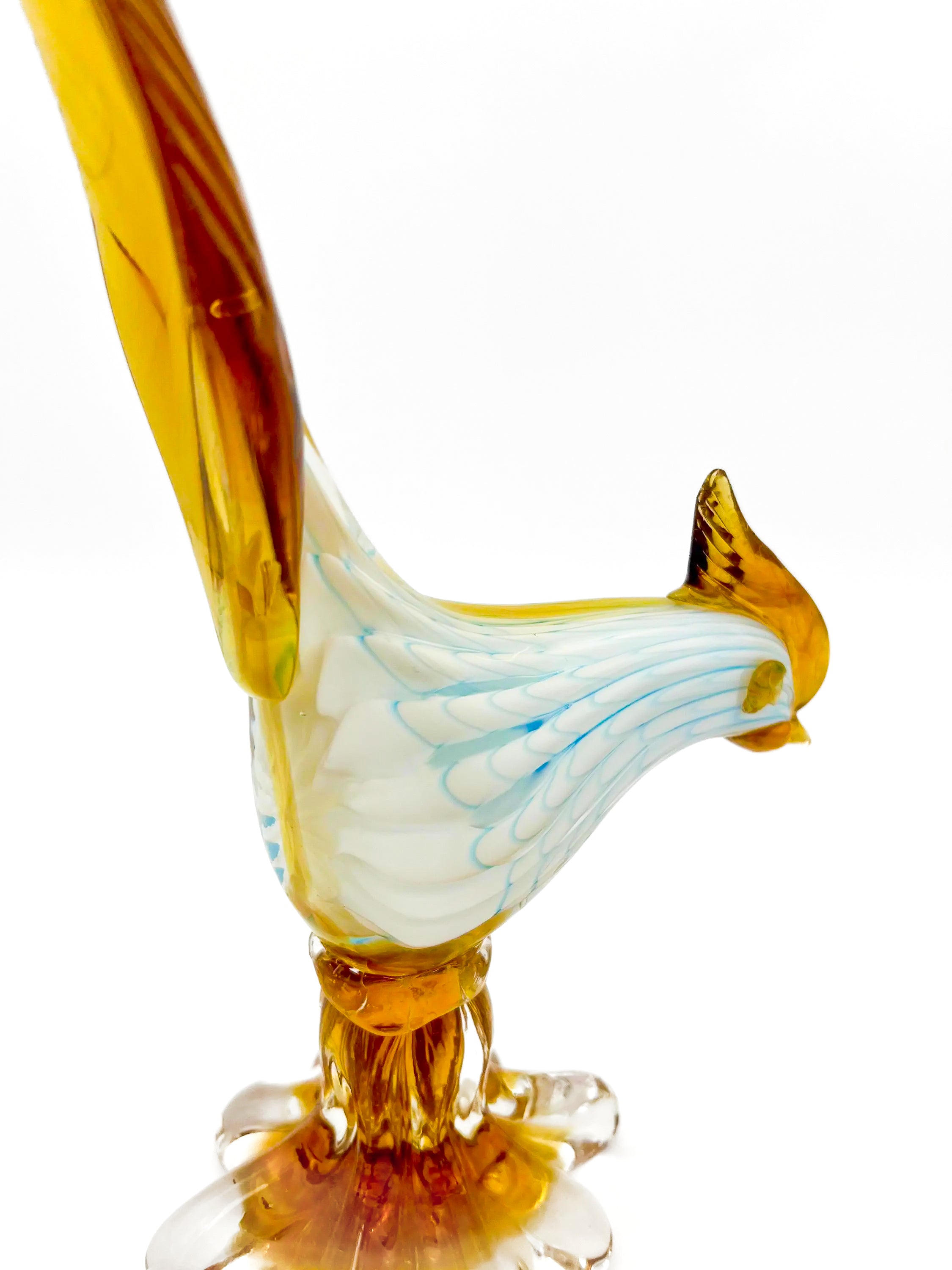 Small decorative vintage figurine of a bird made from delicately hand-blown clear glass.