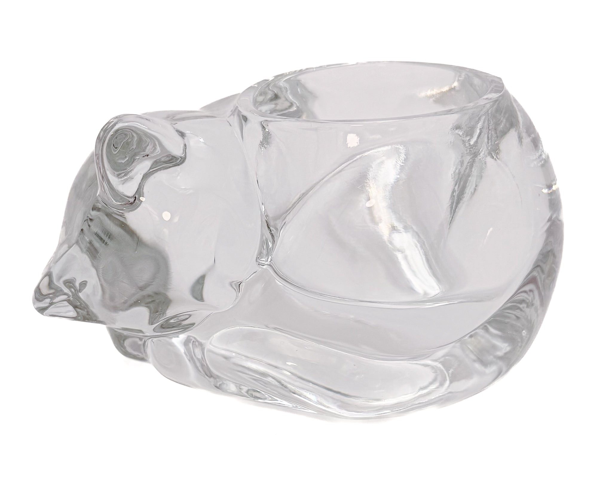 Clear molded glass votive holder shaped like a sleeping cat, vintage Indiana Glass.