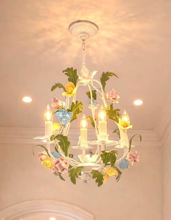 Hand-painted Italian tole chandelier featuring a European garden floral design in pastel colors.