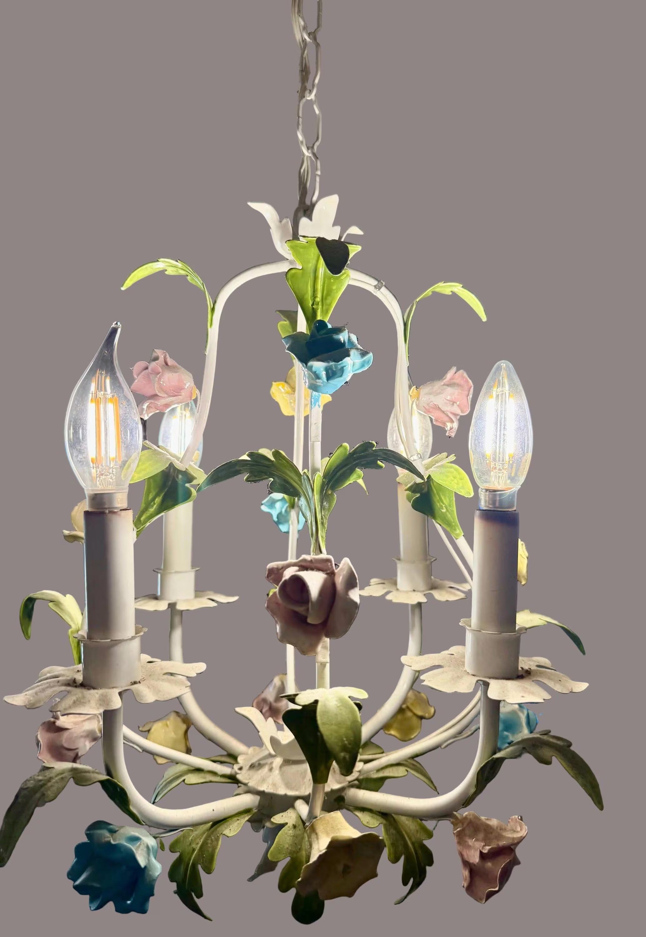 Hand-painted Italian tole chandelier featuring a European garden floral design in pastel colors.