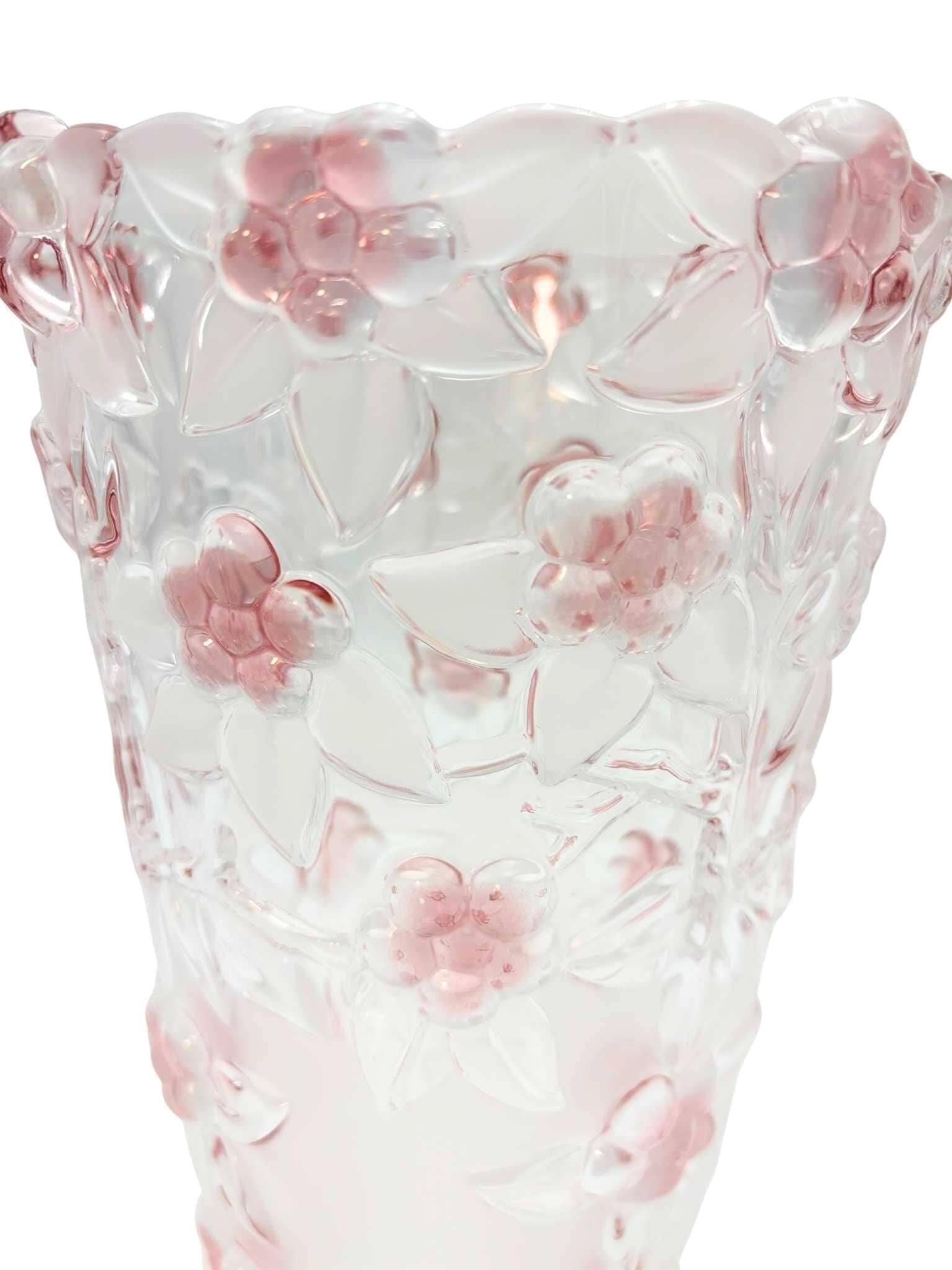 Heavy 9.5-inch crystal statement vase with molded pink blush floral designs.