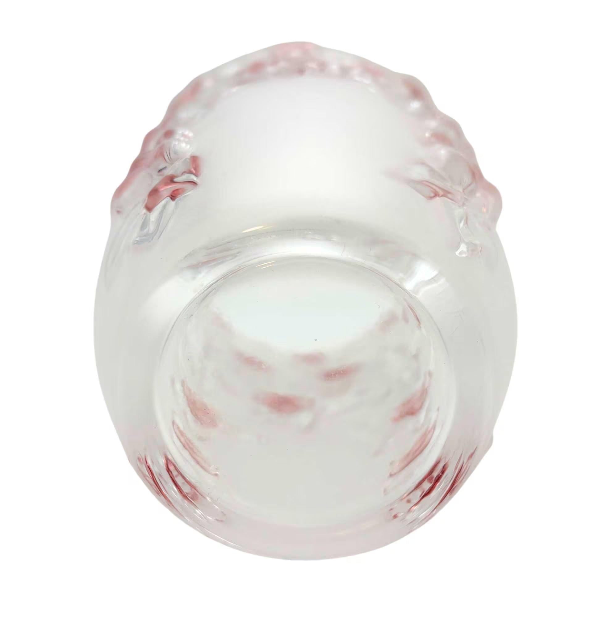 Heavy 9.5-inch crystal statement vase with molded pink blush floral designs.