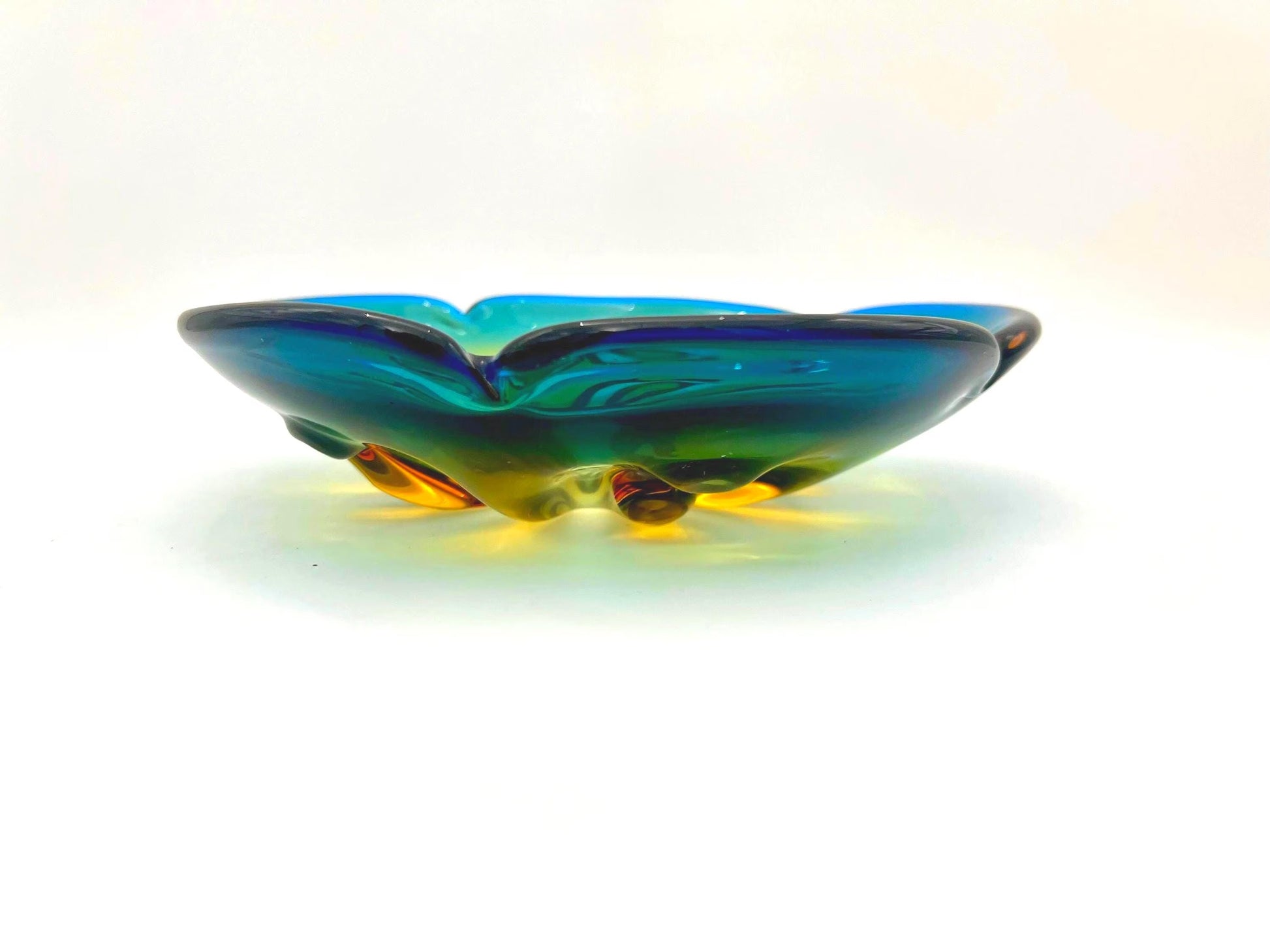 Large vintage art glass bowl with a smooth ombre transition from deep teal green to warm amber.