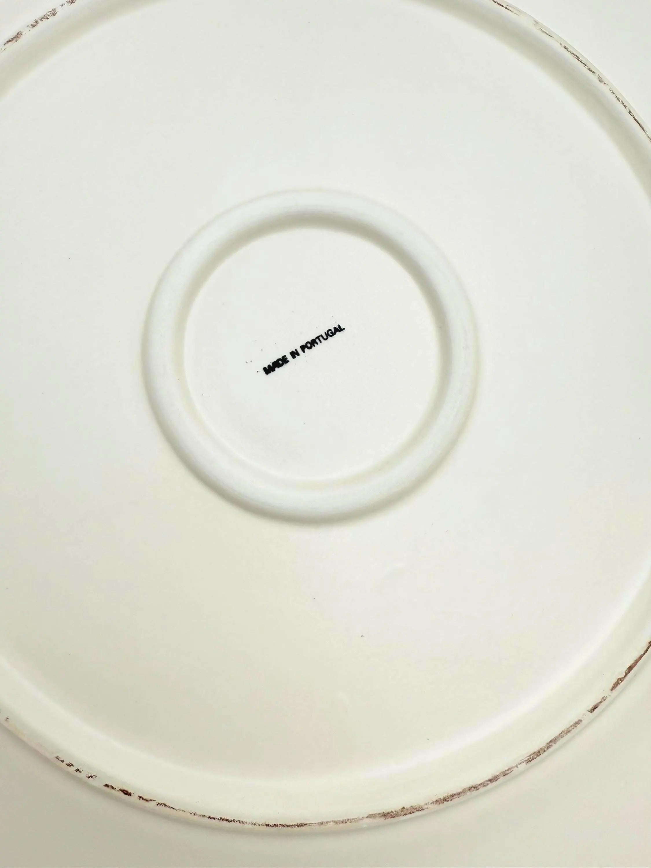 Large Portuguese earthenware dome and matching plate with a cream-white floral relief design.