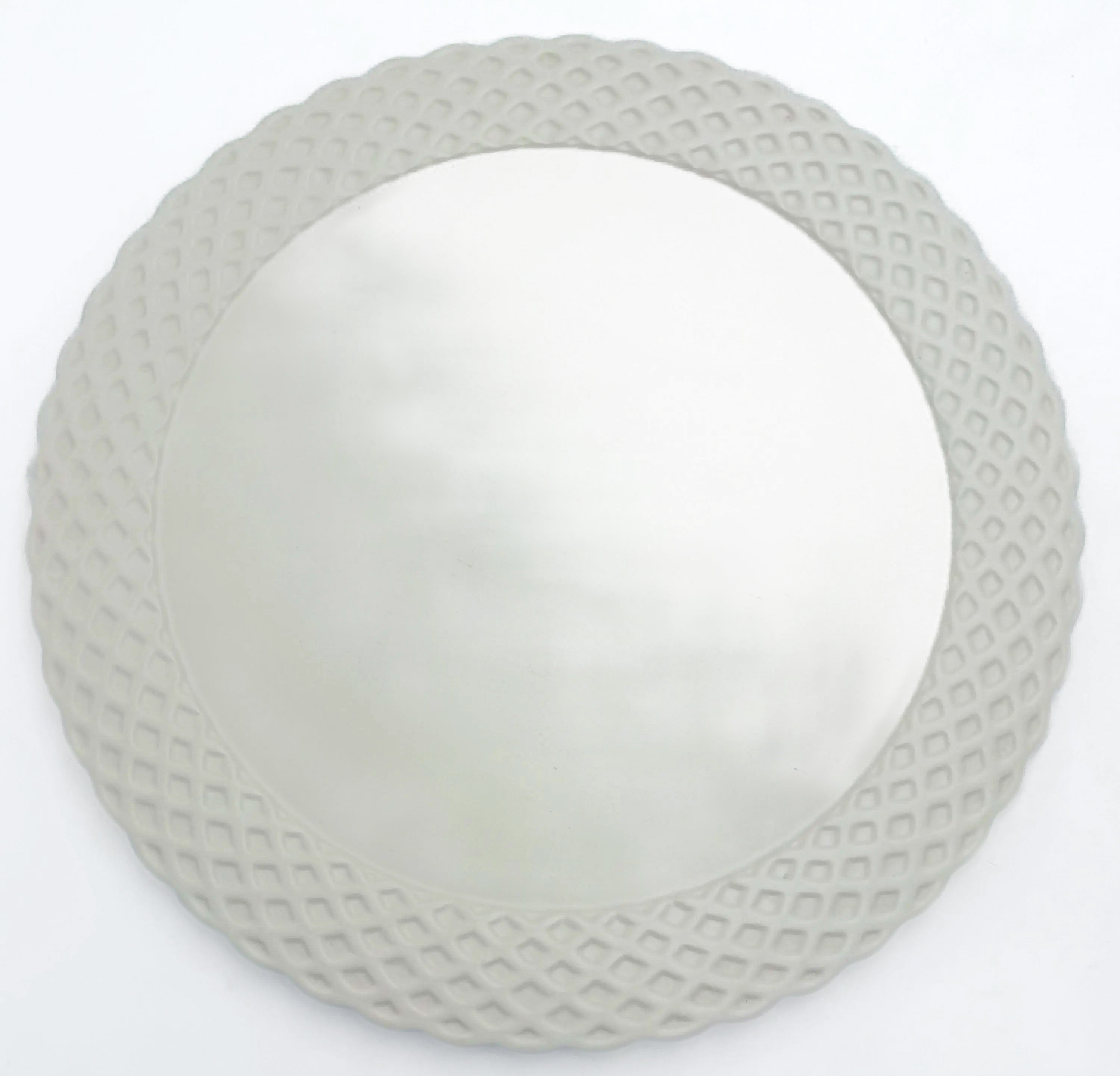 Large Portuguese earthenware dome and matching plate with a cream-white floral relief design.
