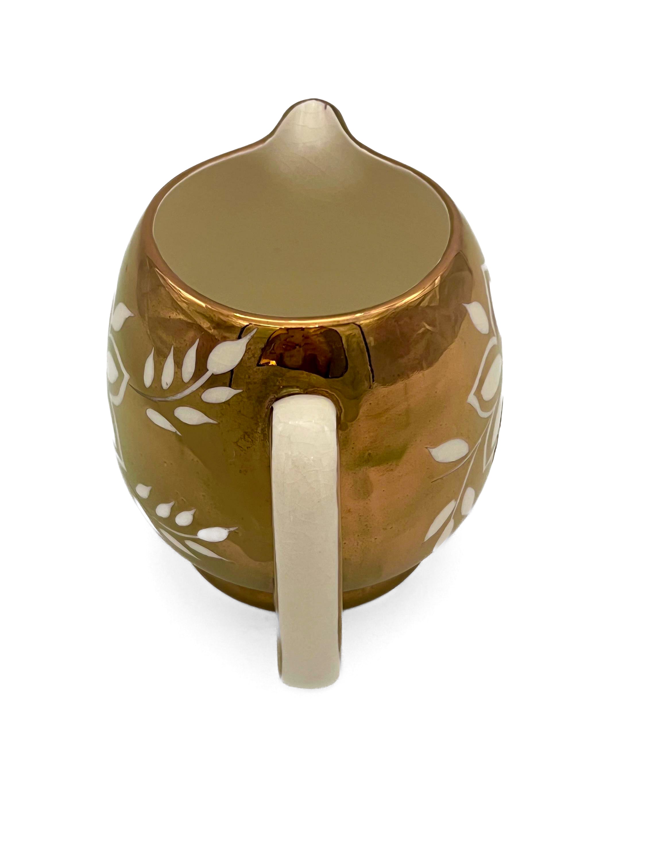 Classic English ceramic creamer pitcher by Price Kensington in a simple, elegant ivory glaze.