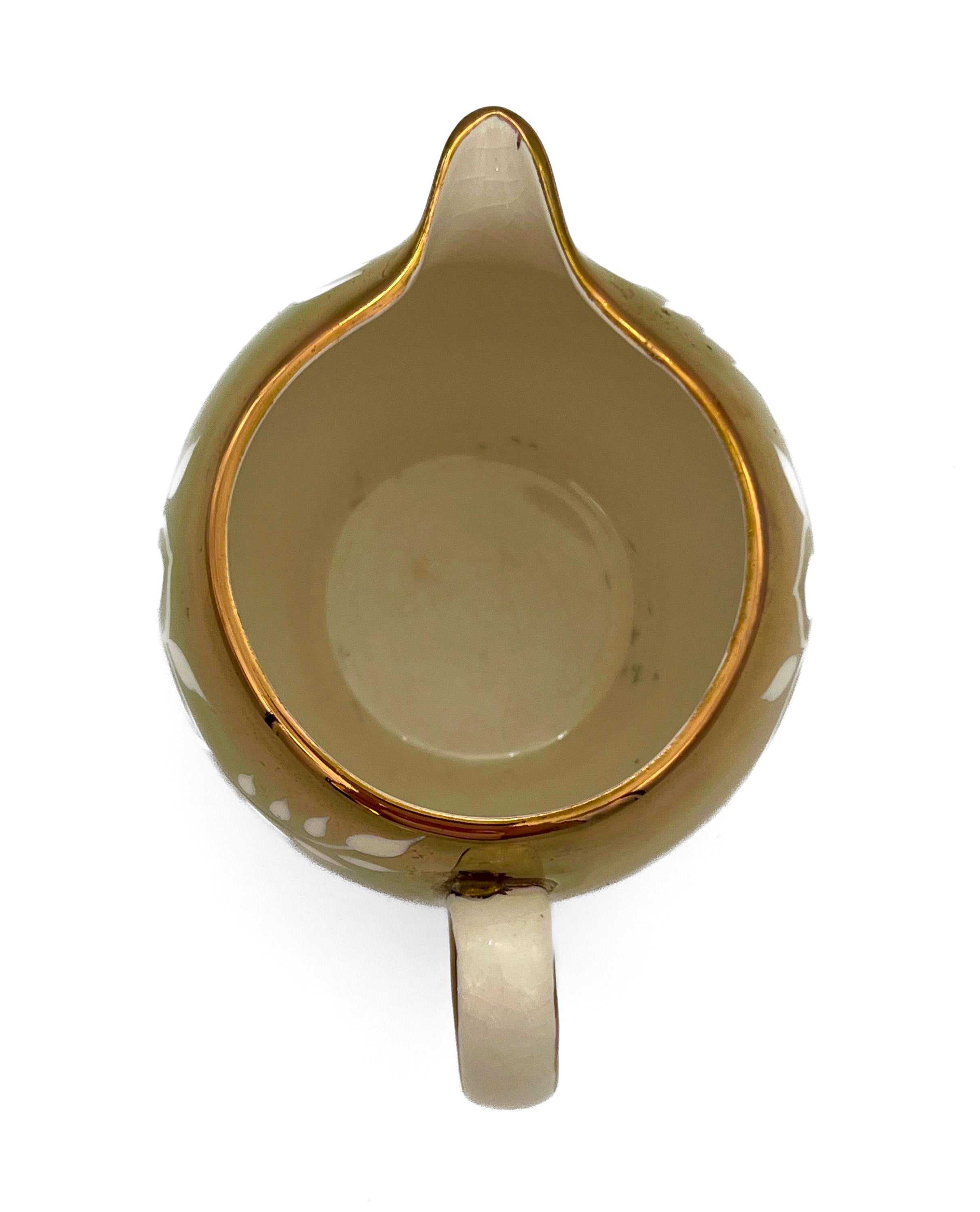 Classic English ceramic creamer pitcher by Price Kensington in a simple, elegant ivory glaze.