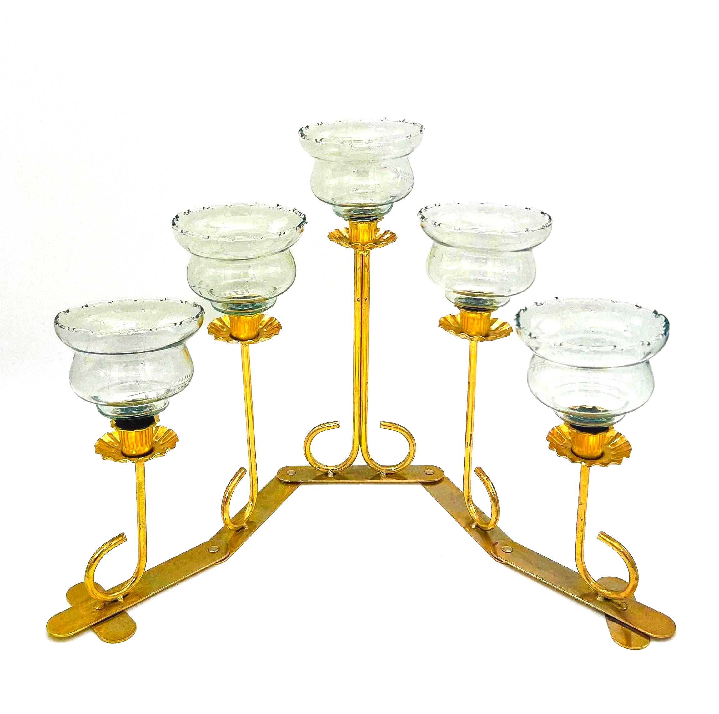 Mid-century solid brass candelabra with adjustable arms for custom candle positioning.
