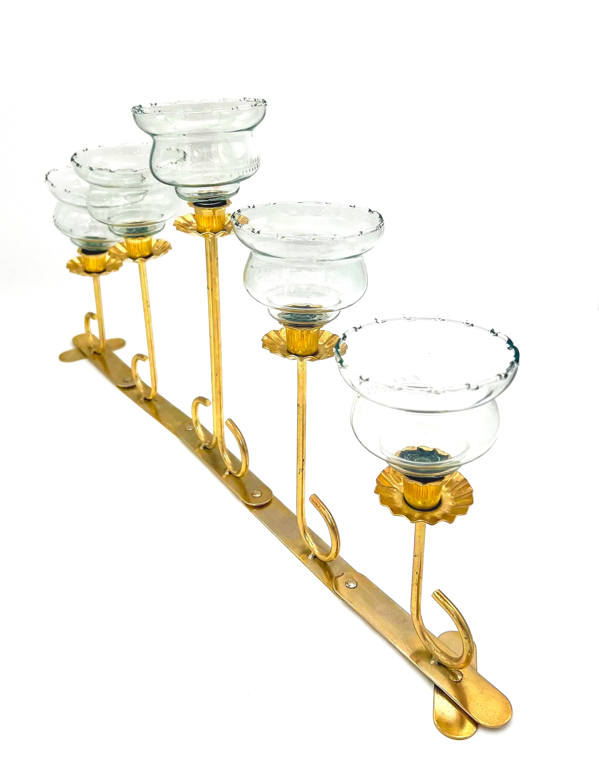 Mid-century solid brass candelabra with adjustable arms for custom candle positioning.