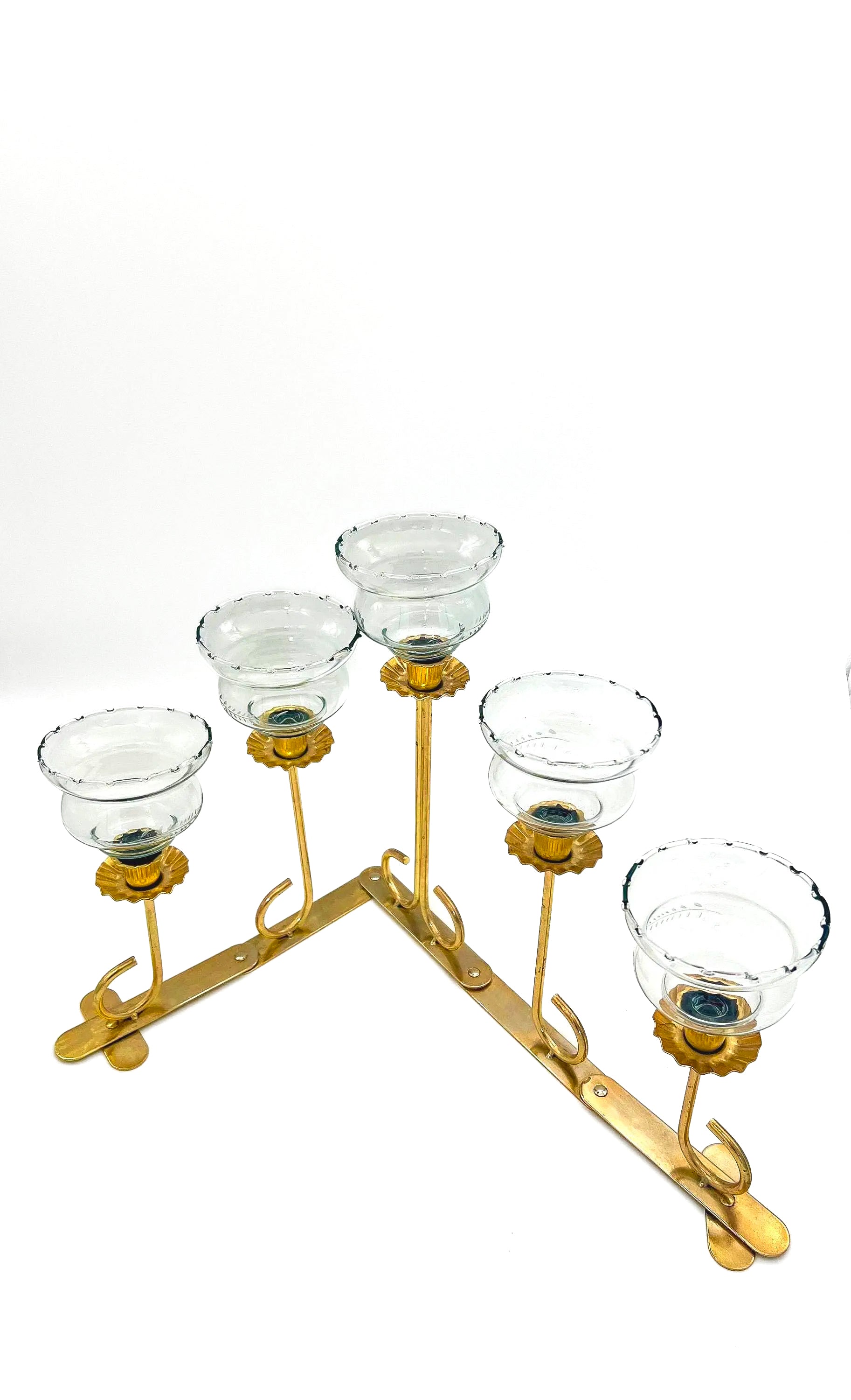 Mid-century solid brass candelabra with adjustable arms for custom candle positioning.